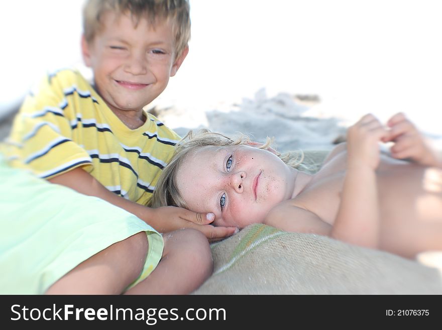 Brother and sister partly isolated over white