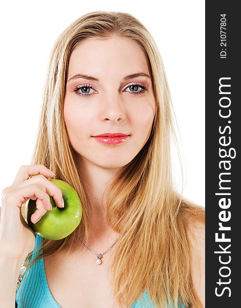 Lovely girl with green apple against white background