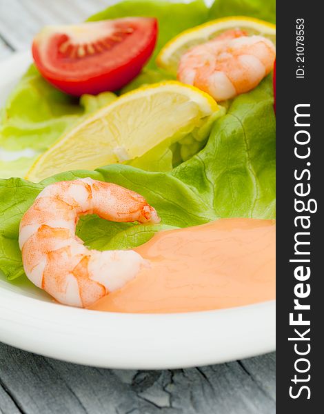 Fresh shrimps salad with tomatoes