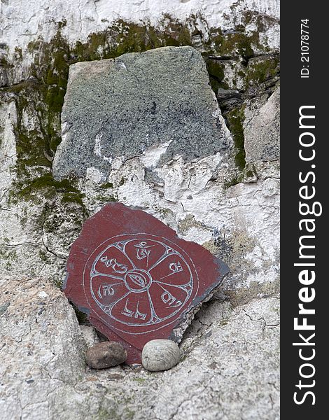 Religious symbol on a slabstone in the potala. Religious symbol on a slabstone in the potala