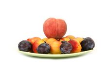 Natural Ripe Plums And Peaches Stock Images