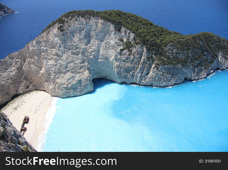 The smugglers cove on Zakynthos with the famous shipwreck. The most famous shipwreck in Europe annually attracts tourists to the Greek island of Zakynthos.