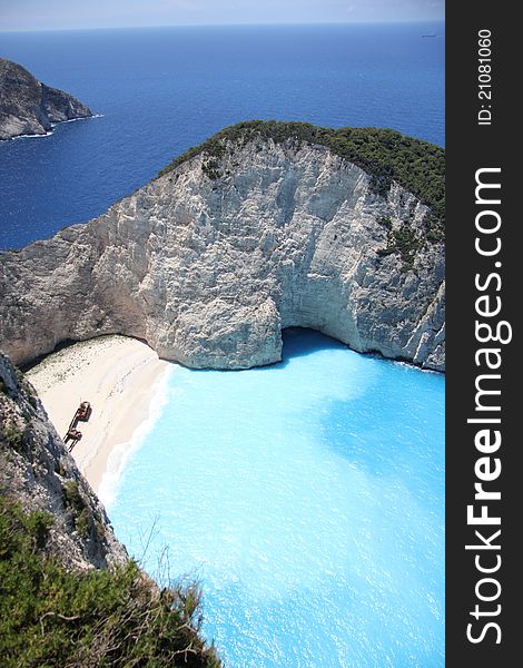 The smugglers cove on Zakynthos with the famous shipwreck. The most famous shipwreck in Europe annually attracts tourists to the Greek island of Zakynthos.