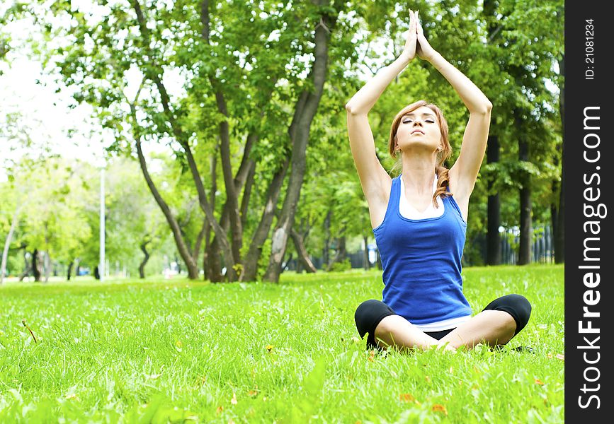 Yoga Woman On Green Grass