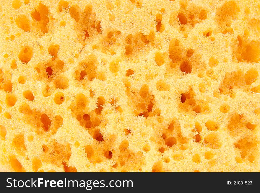 High-resolution yellow sponge texture background.