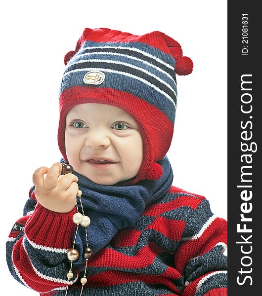 Caucasian baby boy in a cap isolated