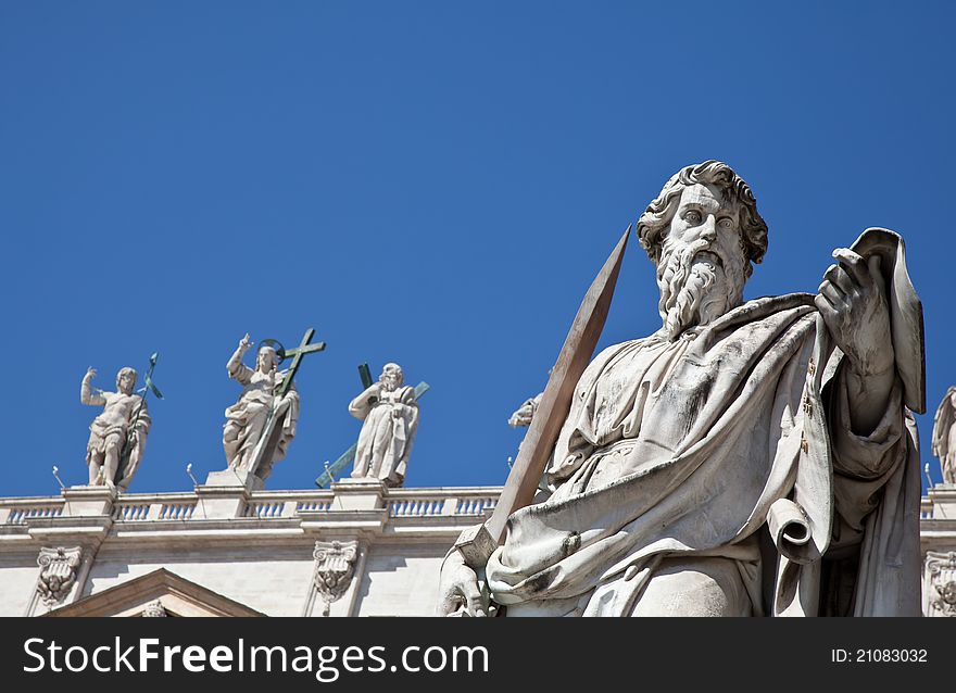 Statues in St. Peter Square (Rome, Italy) with blue sky background. Statues in St. Peter Square (Rome, Italy) with blue sky background