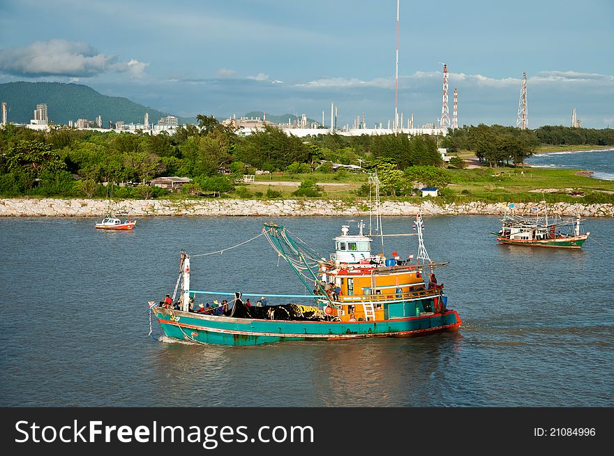 Fishing boat and petrochemical zone in Thailand. Fishing boat and petrochemical zone in Thailand