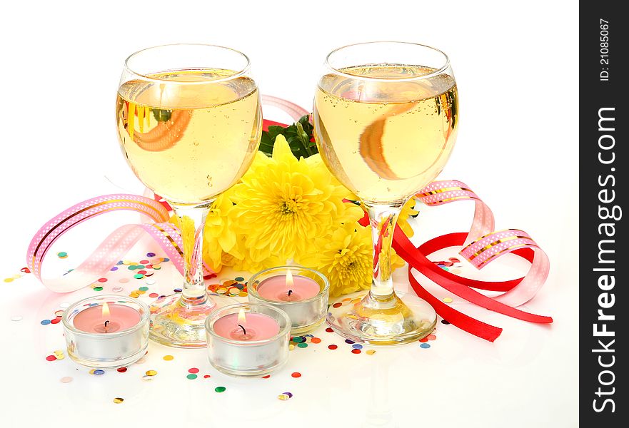 Wine and candles on a white background