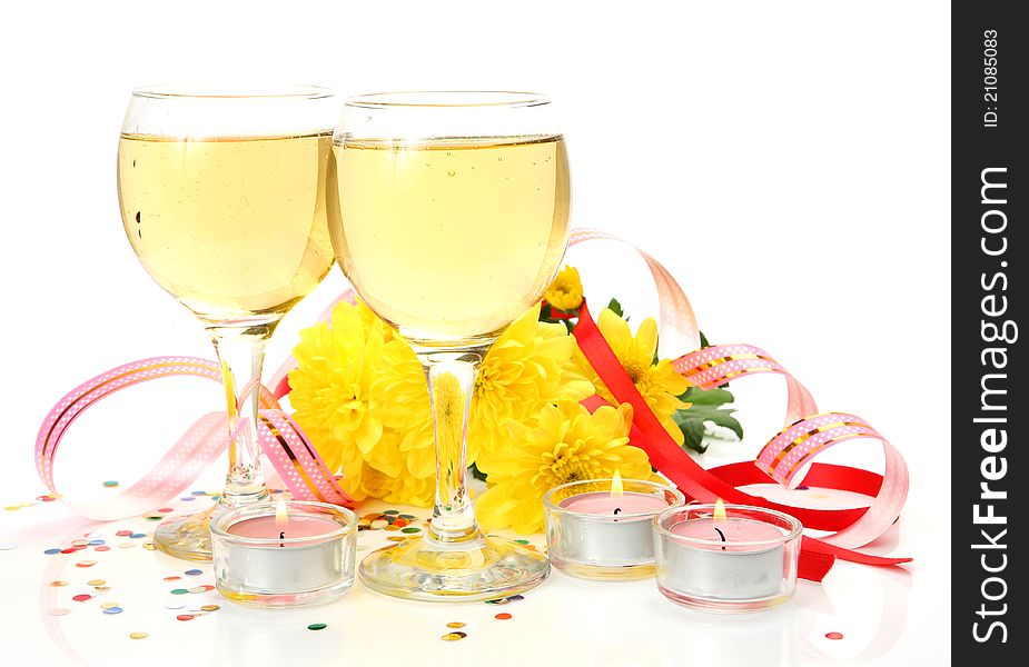 Wine and candles on a white background