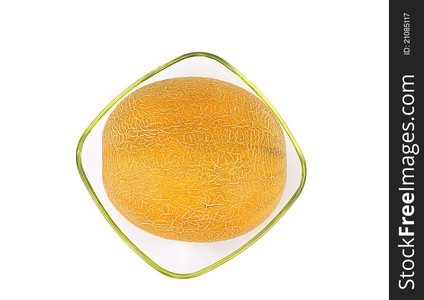 Still life with a natural ripe melon on a clean white background