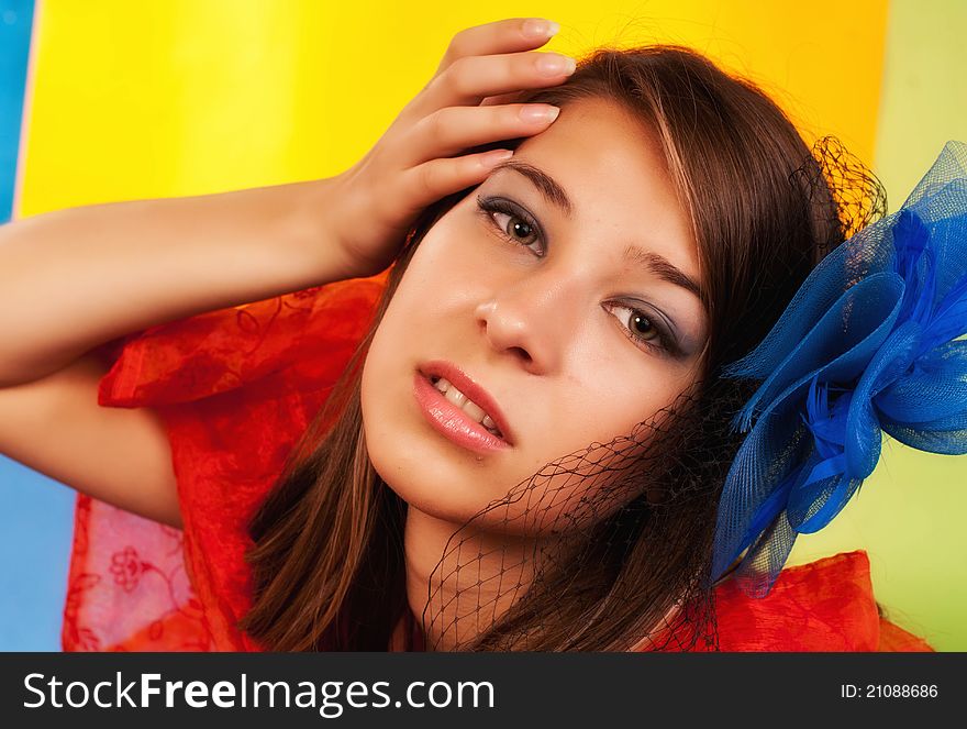 Portrait of a glamour girl on colored background