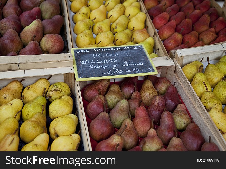 Selection of pears for sale on market stall