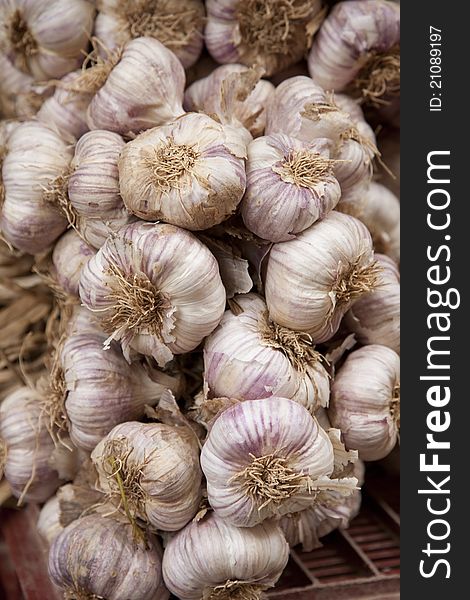 Fresh Garlics for Sale on Market Stall