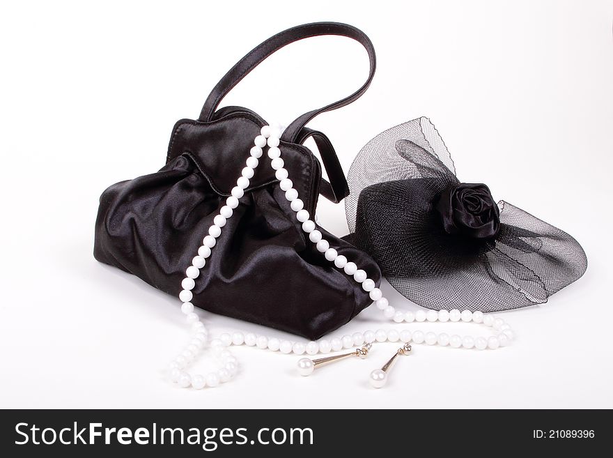 Black purse and hat with jewelry 2