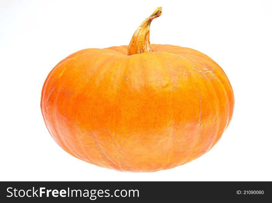 Ripe orange pumpkin isolated on white background