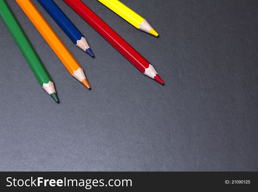 Color Pencils On Black Background