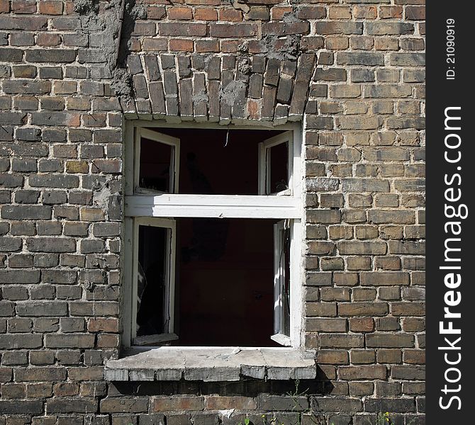 A broken window in an old building