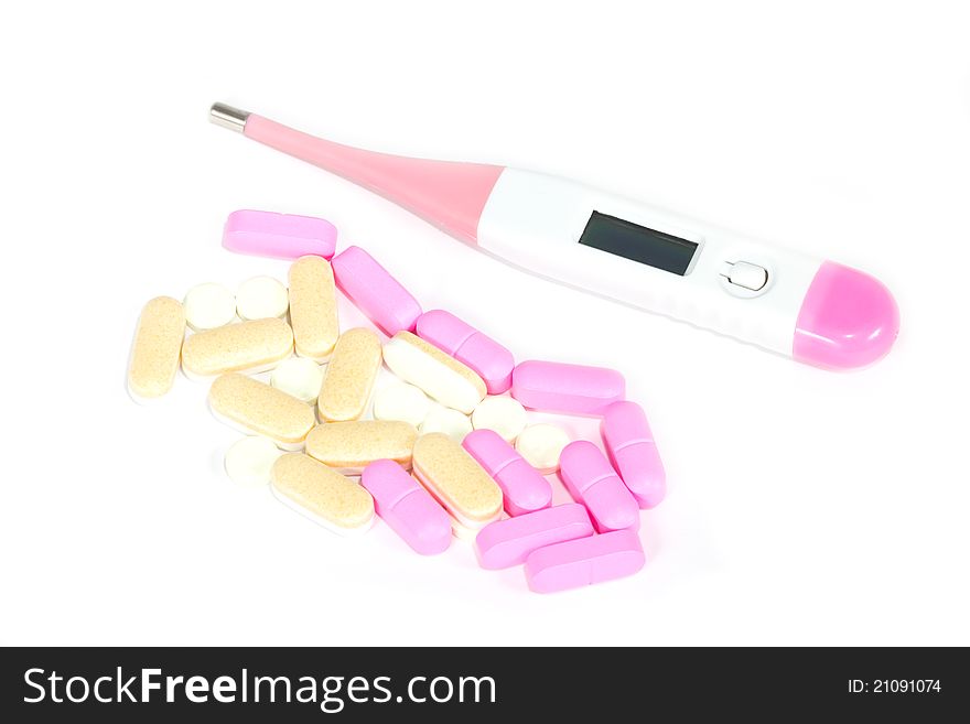 Digital thermometer and pills.