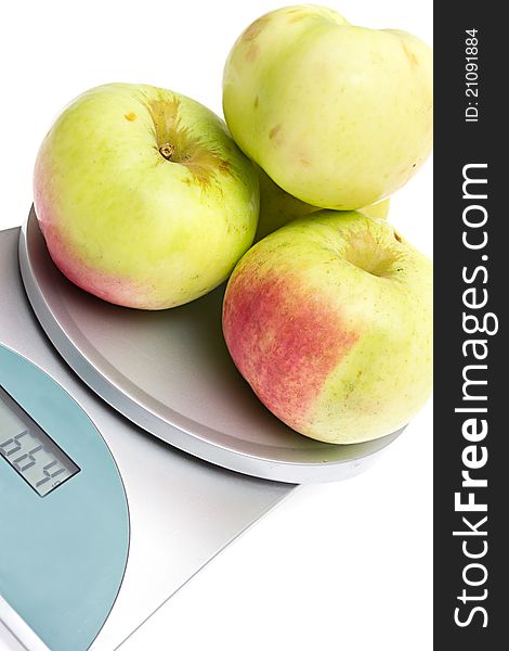 Apples On The Scales On  White