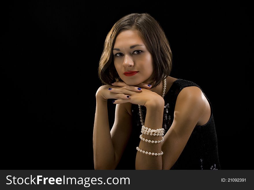 Beautiful young brunette studio portrait. Beautiful young brunette studio portrait