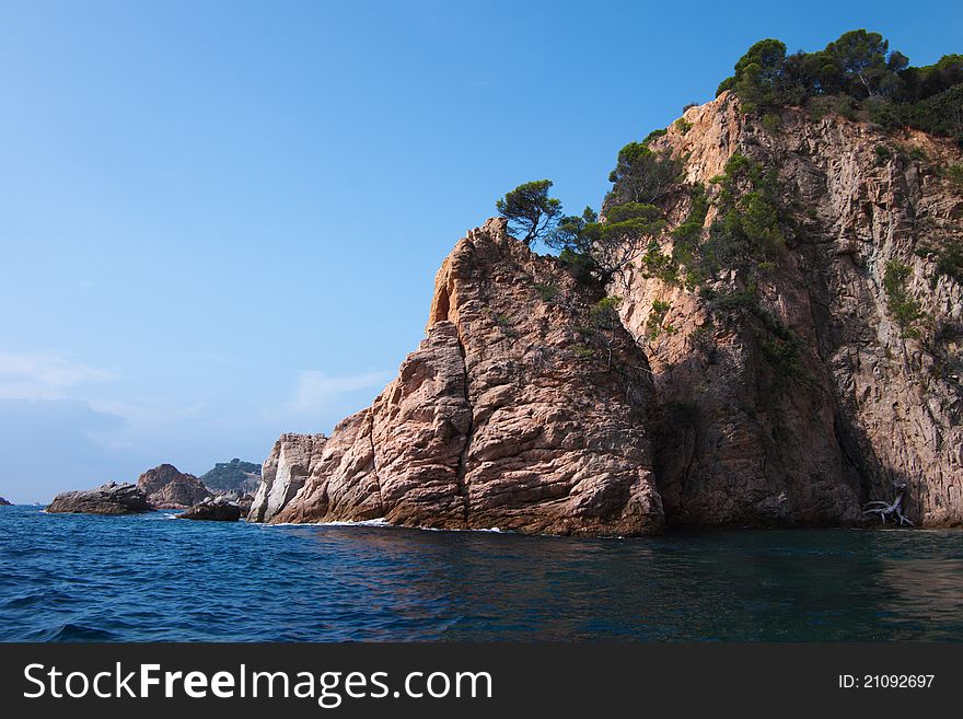 Summer seascape with waves and rocks, Costa Brava, Spain. August 2011. Summer seascape with waves and rocks, Costa Brava, Spain. August 2011.