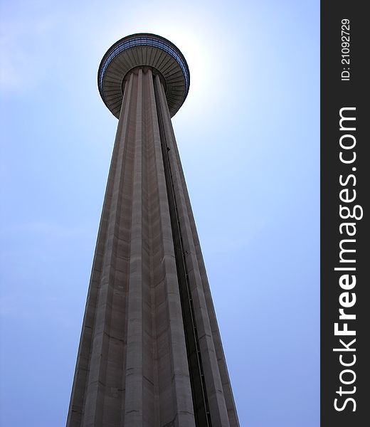 Upshot picture of a tower blocking the sun with blue sky. Upshot picture of a tower blocking the sun with blue sky.