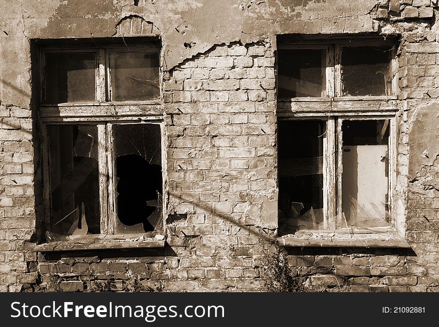 Broken windows in an old building