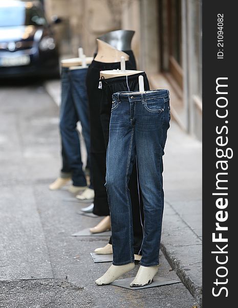 Mannequins wearing jeans in a row. Mannequins wearing jeans in a row