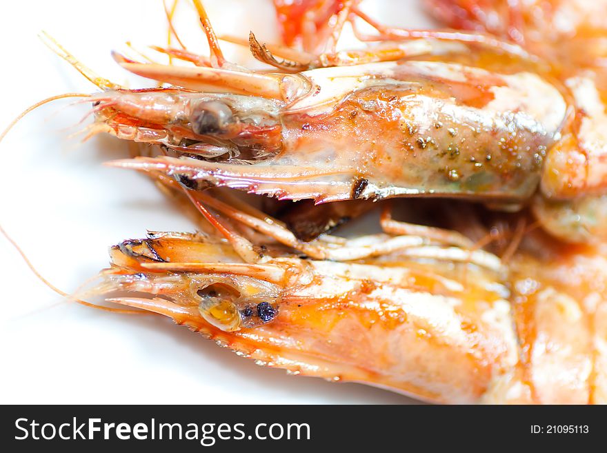 Fired shrimps on white background