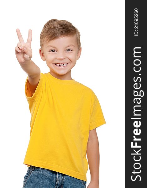 Portrait of little boy showing victory hand sign on white background. Portrait of little boy showing victory hand sign on white background