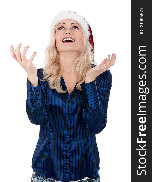 Portrait of a emotional beautiful christmas girl wearing Santa hat. Isolated on white background.