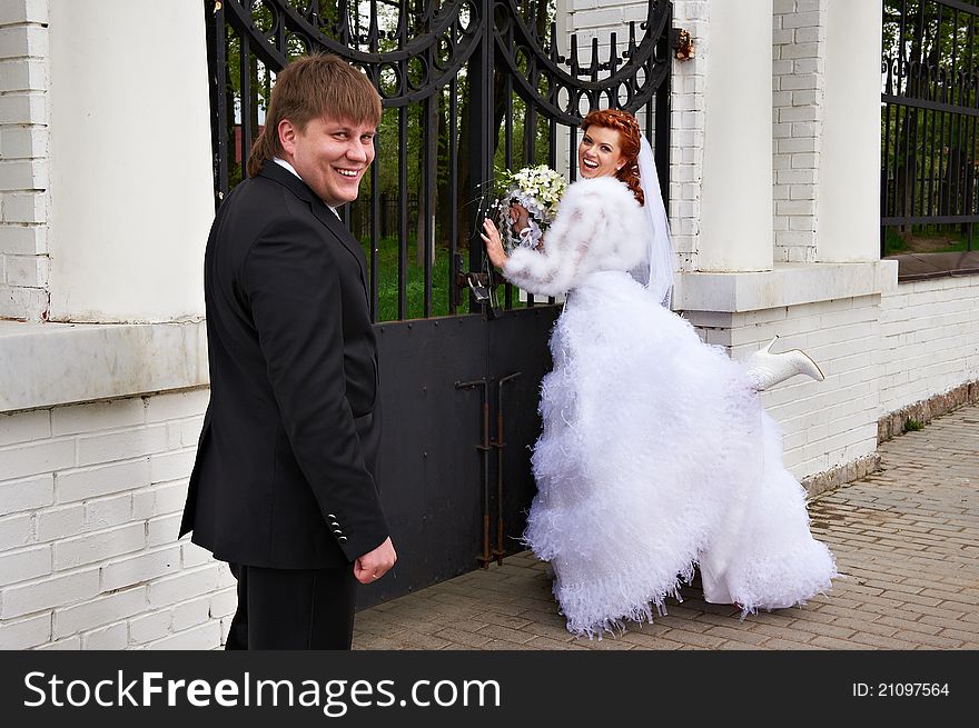 Happy Bride And Groom In Park