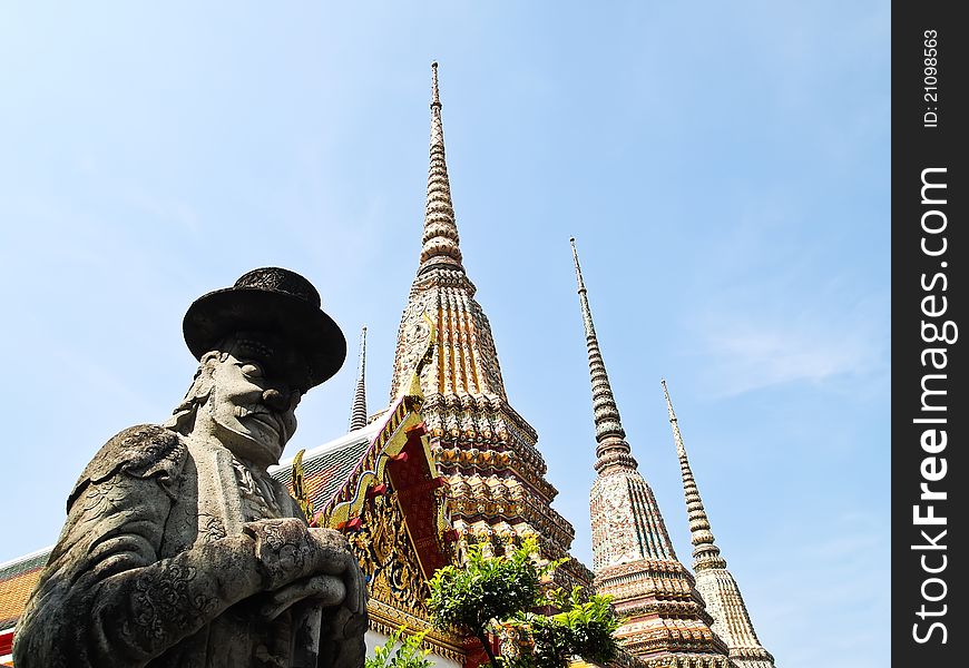 Stone Giant statue at Wat Pho Bangkok, Thailand