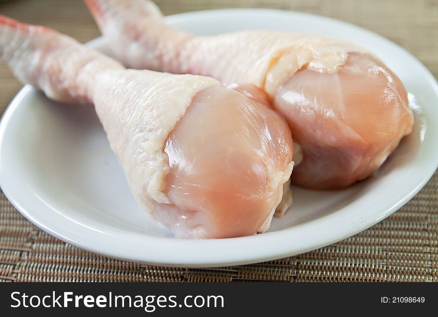 Fresh chicken on plate, raw food for cook. Fresh chicken on plate, raw food for cook