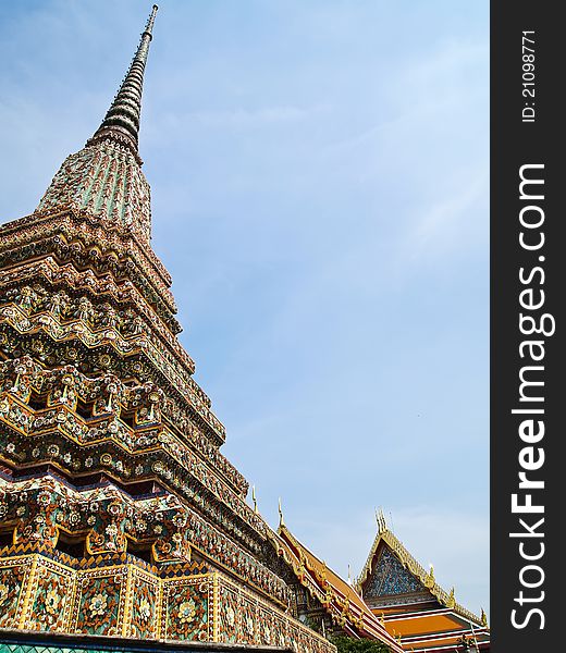 Ancient Pagoda With Wat Pho On The Background