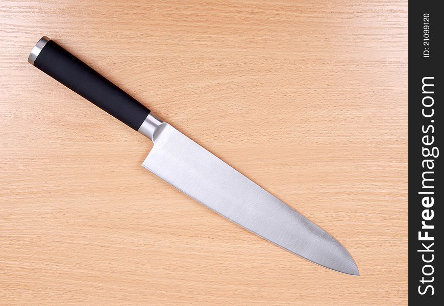 Kitchen knives on wood