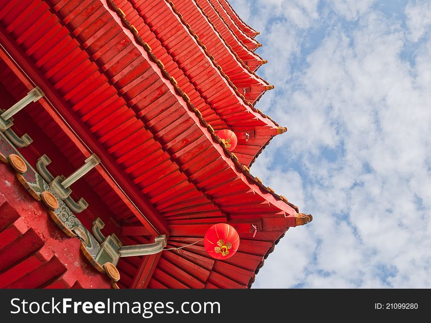 Closeup shot of traditional Oriental Chinese architectural details against beautiful sky. Closeup shot of traditional Oriental Chinese architectural details against beautiful sky.
