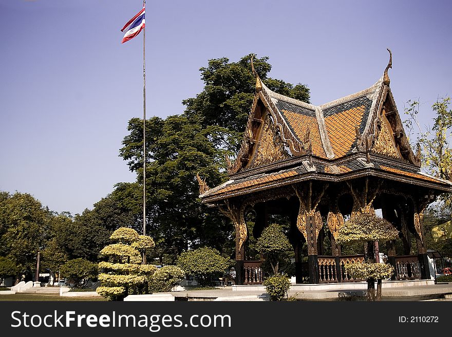 Traditional Thai Building with Thai flag