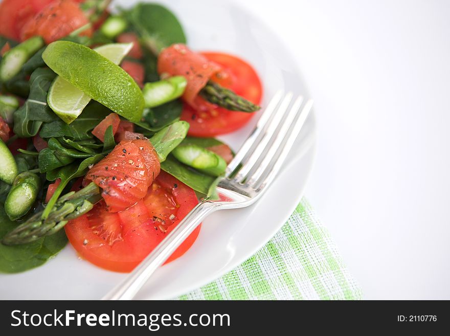 Asparagus, smoked salmon & rocket salad - shallow depth of field. Asparagus, smoked salmon & rocket salad - shallow depth of field