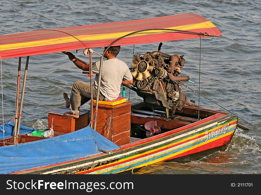 Close up of a long tailed boat on the Chao Praya River in Bangkok, Thailand. Close up of a long tailed boat on the Chao Praya River in Bangkok, Thailand