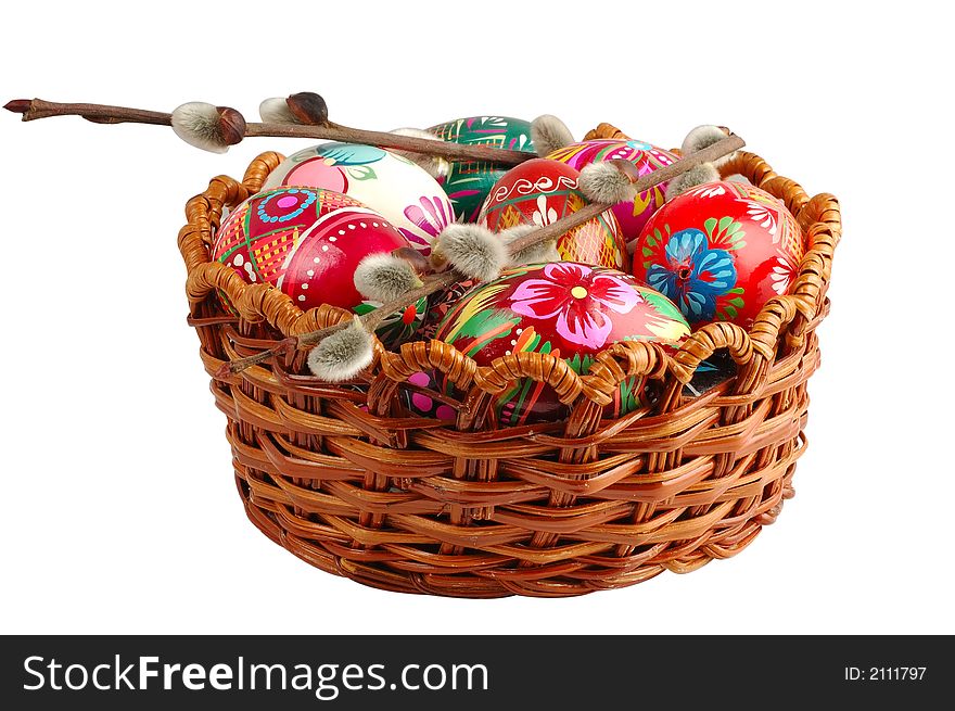 Basket with easter eggs isolated on white background. Basket with easter eggs isolated on white background