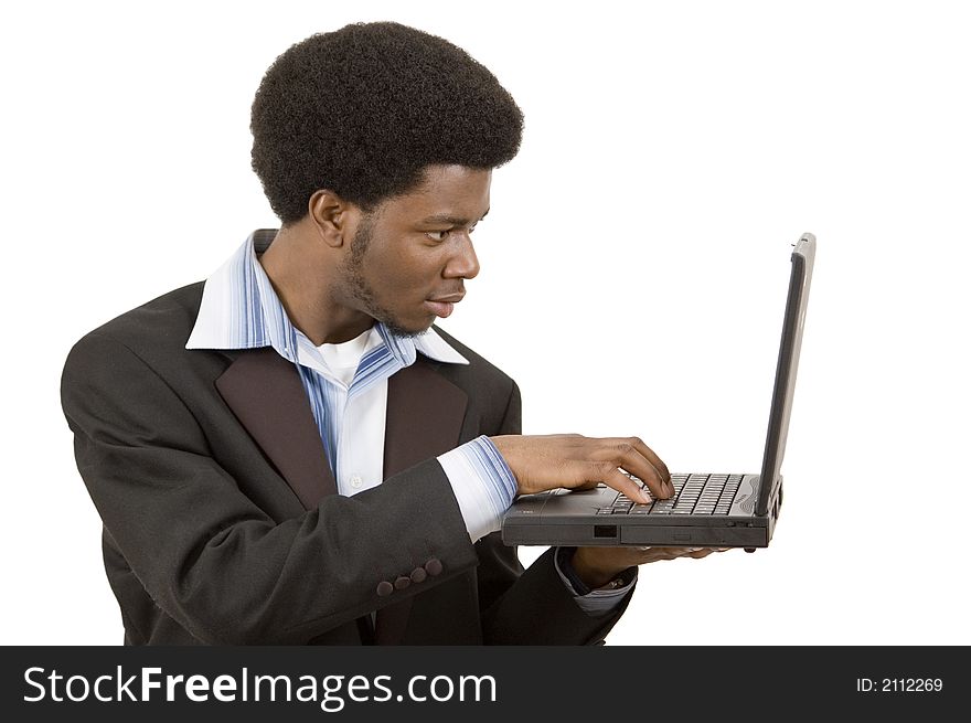 This is an image of a businessman using a laptop. This image can be used represent Internet Browsing etc. This is an image of a businessman using a laptop. This image can be used represent Internet Browsing etc.