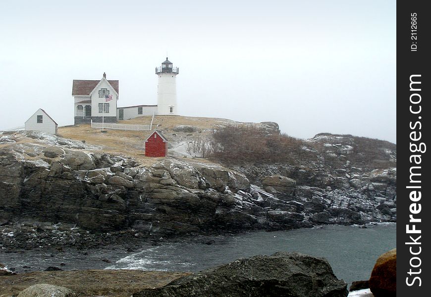 Cape Neddick - Nubble Light during a snowstorm. Cape Neddick - Nubble Light during a snowstorm