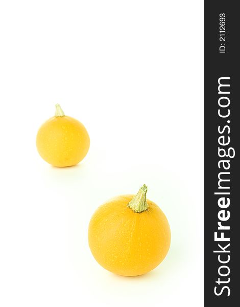 Two orange pumpkins on the white background. Two orange pumpkins on the white background