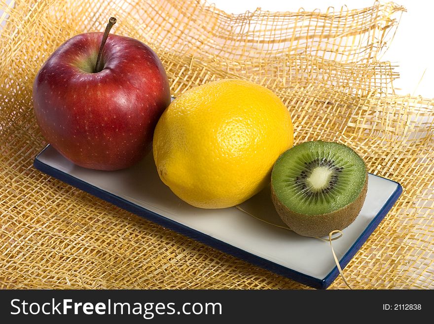 A photo of three fruits. A photo of three fruits