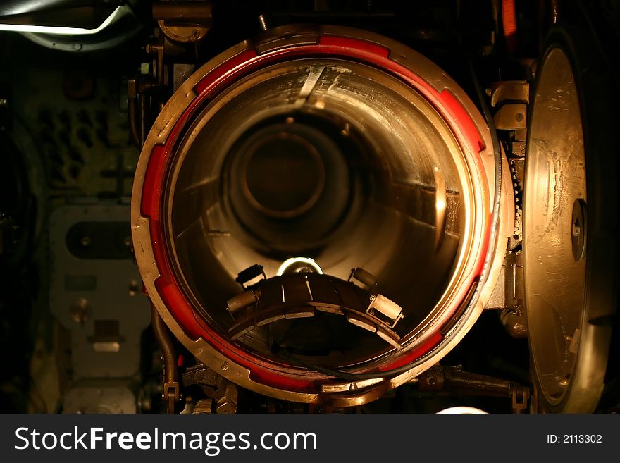 An empty slot for torpedo in a historic military submarine boat. An empty slot for torpedo in a historic military submarine boat