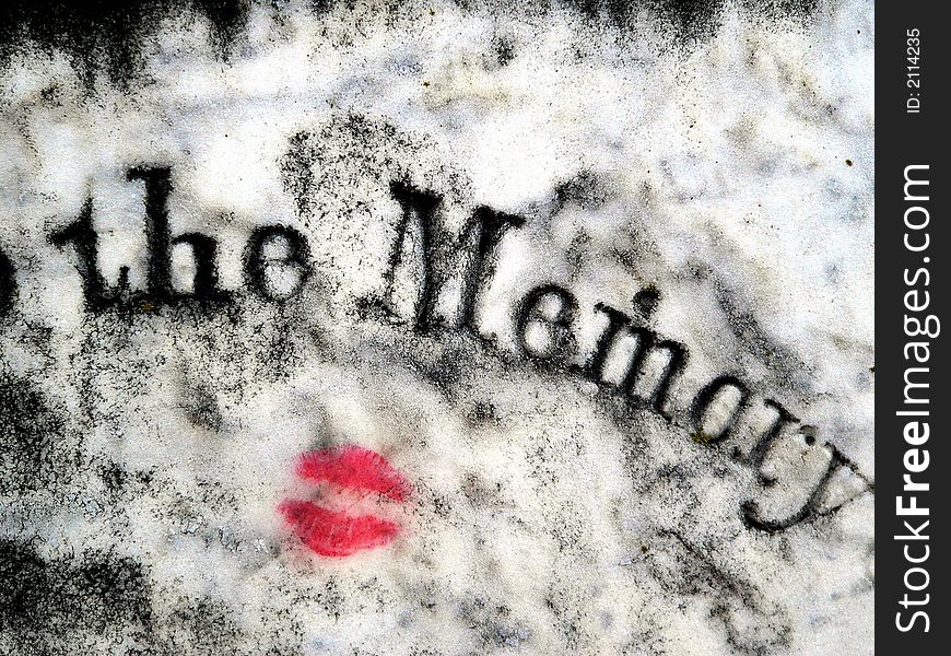Old marble tombstone with a fresh coat of lipstick. Old marble tombstone with a fresh coat of lipstick