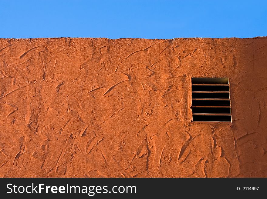 Stucco Wall Orange Texture Background.