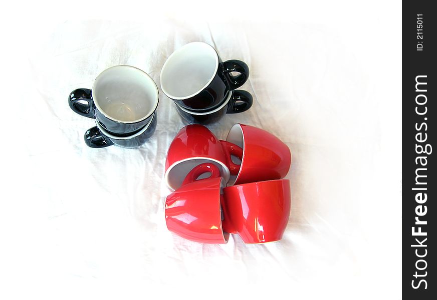 Eight Black and red cups isolated over white. Eight Black and red cups isolated over white